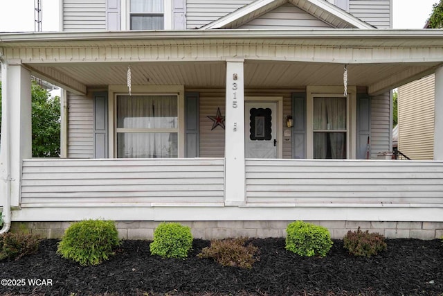 315 W Main St, Cairo, OH 45820 - property entrance featuring covered porch