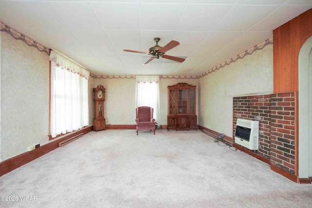 315 W Main St, Cairo, OH 45820 - sitting room with heating unit, a ceiling fan, and light colored carpet