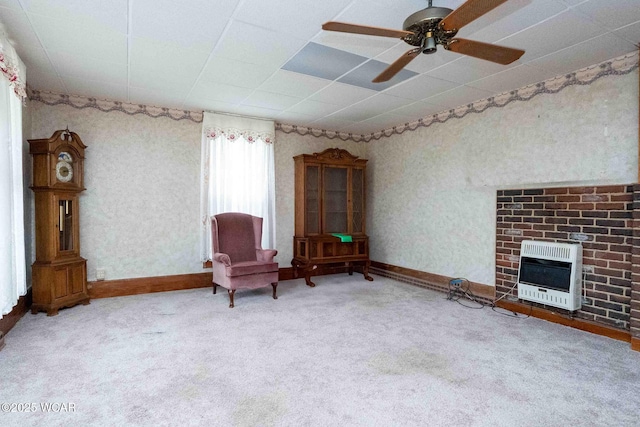 315 W Main St, Cairo, OH 45820 - living area featuring heating unit, carpet, ceiling fan, and wallpapered walls