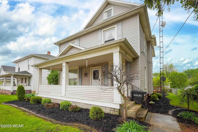 315 W Main St, Cairo, OH 45820 - view of front facade featuring covered porch