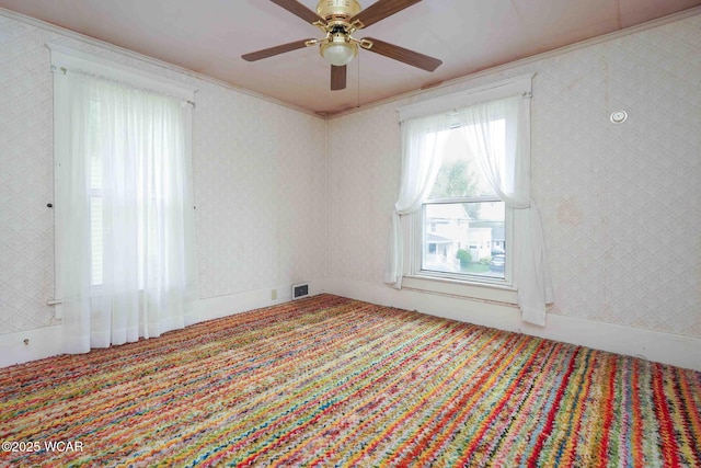 315 W Main St, Cairo, OH 45820 - carpeted empty room featuring crown molding and ceiling fan