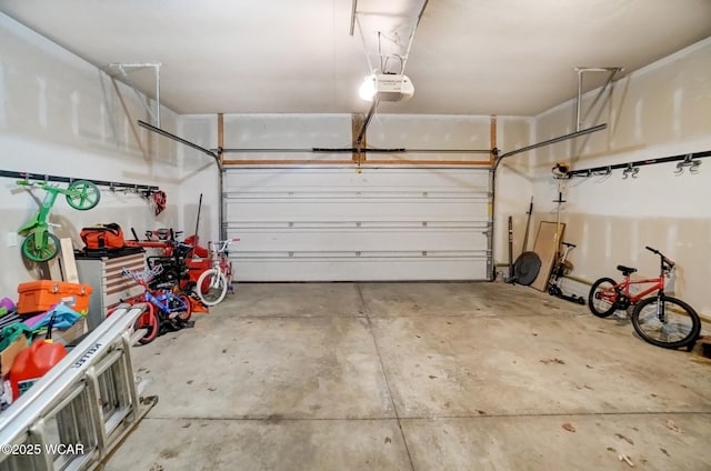 garage featuring a garage door opener