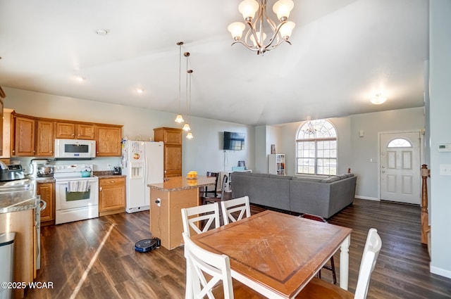 dining space with lofted ceiling, a notable chandelier, baseboards, and dark wood-style flooring