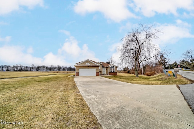 view of front facade featuring brick siding, an attached garage, concrete driveway, and a front lawn