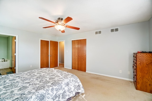 bedroom with visible vents, ceiling fan, carpet, and baseboards