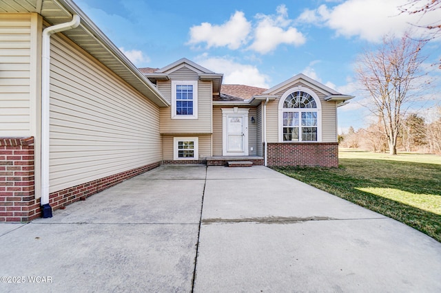 exterior space with a lawn