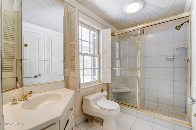 bathroom with walk in shower, tile patterned floors, toilet, and vanity