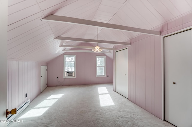 additional living space with light carpet, vaulted ceiling with beams, cooling unit, and a baseboard radiator