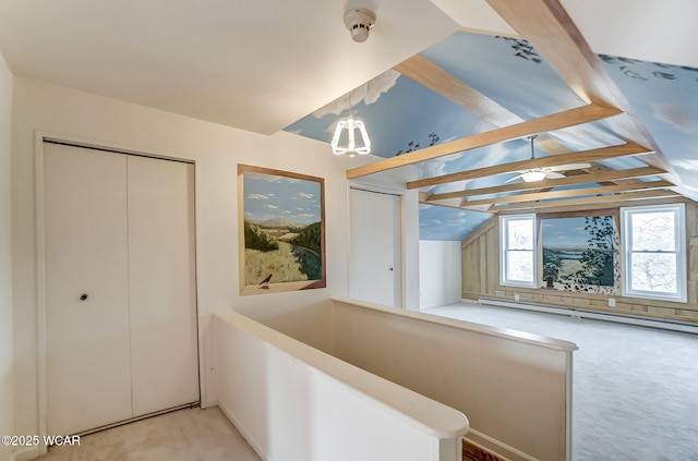 hall featuring lofted ceiling, light carpet, and a baseboard heating unit