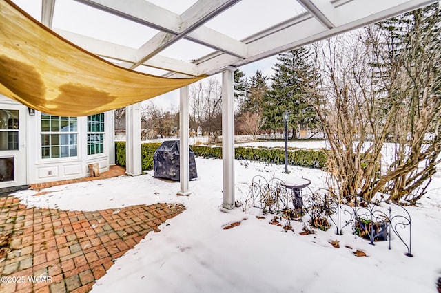 view of snow covered patio