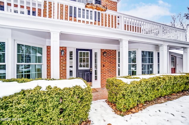 entrance to property with covered porch