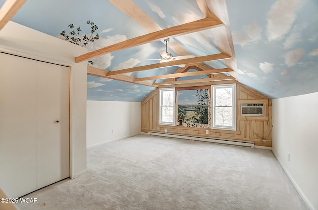 additional living space featuring a baseboard heating unit, a wall mounted air conditioner, vaulted ceiling, and carpet flooring