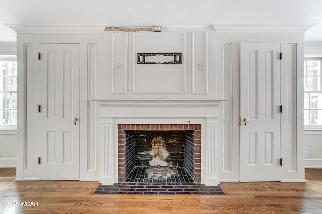 details featuring crown molding and hardwood / wood-style floors