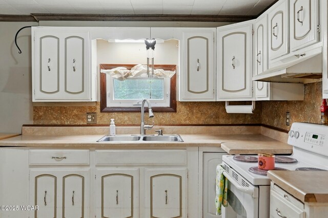 1398 Lutz Rd, Lima, OH 45801 - kitchen with white electric range, a sink, under cabinet range hood, backsplash, and light countertops