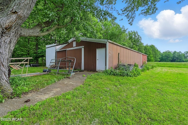 1398 Lutz Rd, Lima, OH 45801 - view of pole building with a yard