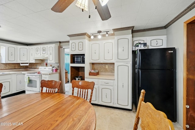 1398 Lutz Rd, Lima, OH 45801 - kitchen with white electric stove, freestanding refrigerator, under cabinet range hood, ceiling fan, and tasteful backsplash