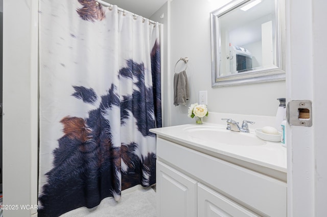 127 Brads Way, Russells Point, OH 43348 - bathroom featuring vanity and a shower with curtain