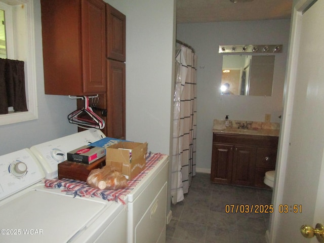 514 S Wayne St, Kenton, OH 43326 - laundry area featuring washer and clothes dryer and light tile patterned floors