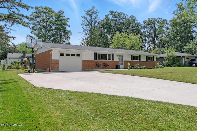 2238 N Glenwood Ave, Lima, OH 45805 - single story home with an attached garage, brick siding, driveway, and a front lawn
