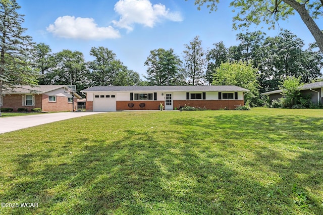 2238 N Glenwood Ave, Lima, OH 45805 - ranch-style house with driveway, brick siding, a garage, and a front yard