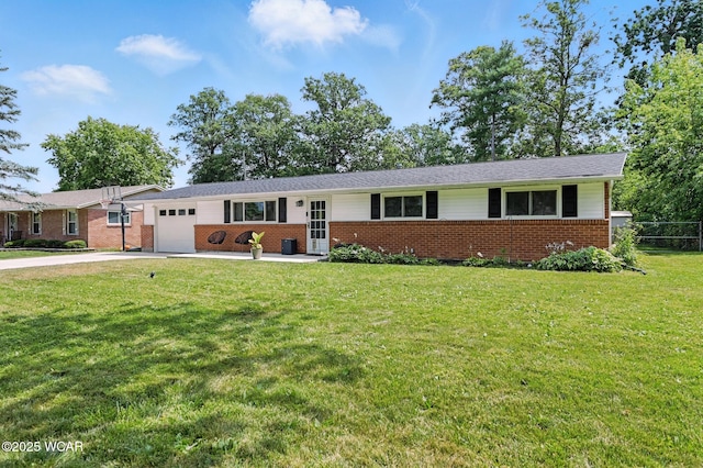 2238 N Glenwood Ave, Lima, OH 45805 - ranch-style home featuring brick siding, a garage, concrete driveway, and a front lawn