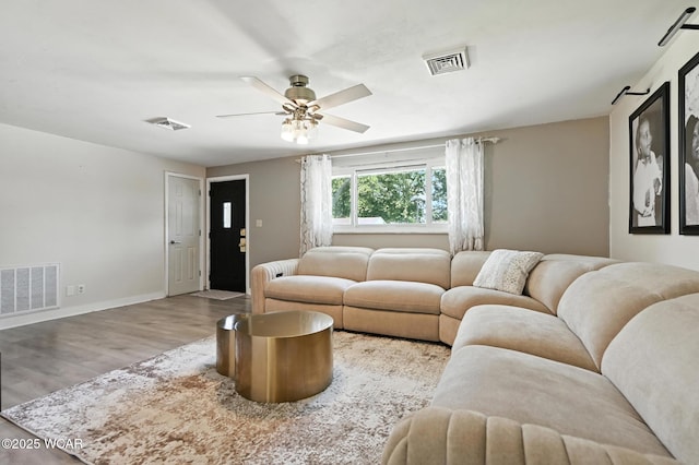 2238 N Glenwood Ave, Lima, OH 45805 - living area with a ceiling fan and wood finished floors