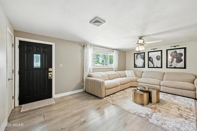 2238 N Glenwood Ave, Lima, OH 45805 - living area featuring light wood-style flooring and a ceiling fan