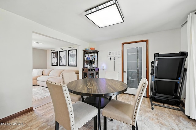 2238 N Glenwood Ave, Lima, OH 45805 - dining area featuring baseboards