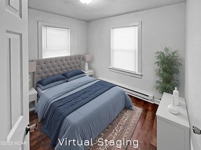 556 Cortlandt Ave, Lima, OH 45801 - bedroom featuring baseboard heating and dark wood-style floors