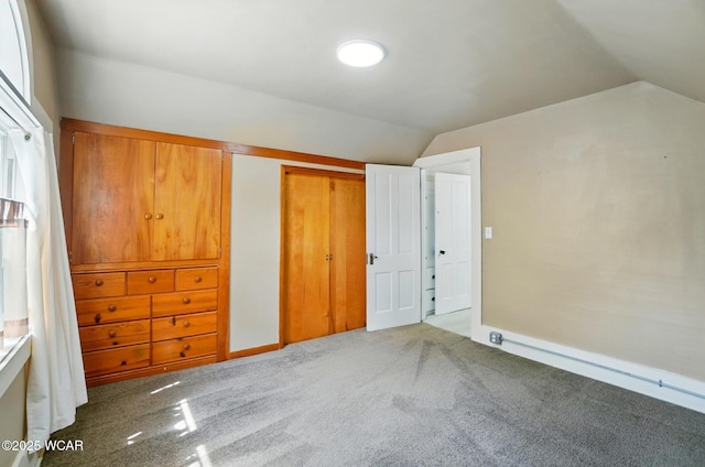510 N Walnut St, Van Wert, OH 45891 - unfurnished bedroom with lofted ceiling, carpet, and a closet