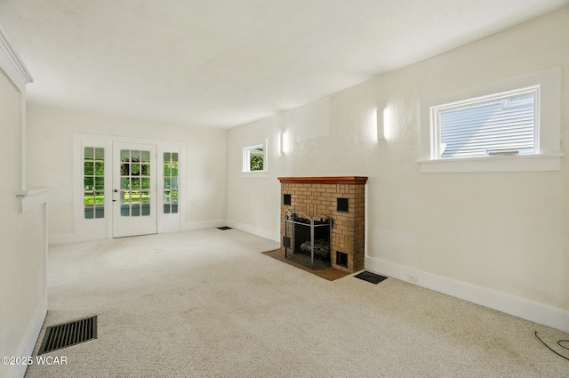 510 N Walnut St, Van Wert, OH 45891 - unfurnished living room with carpet and a fireplace