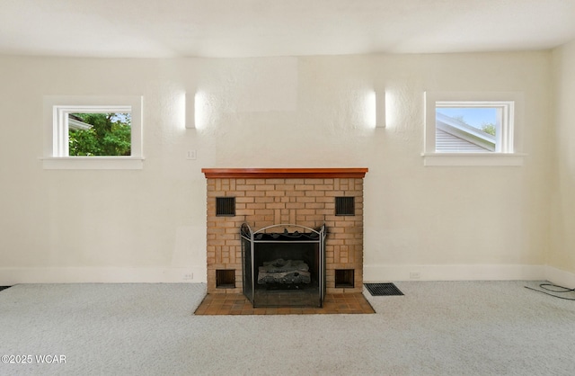510 N Walnut St, Van Wert, OH 45891 - unfurnished living room featuring carpet and a fireplace
