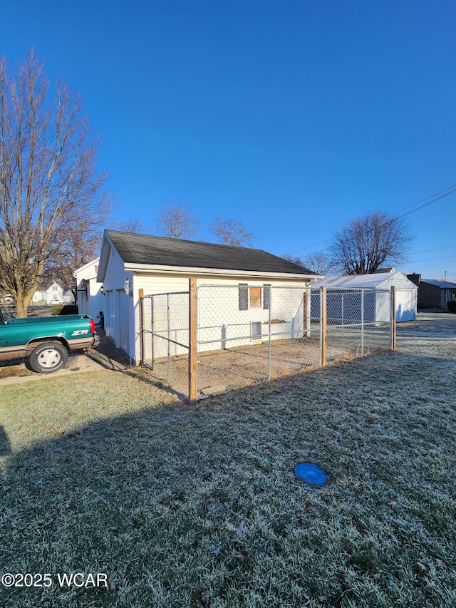 view of side of property featuring a yard