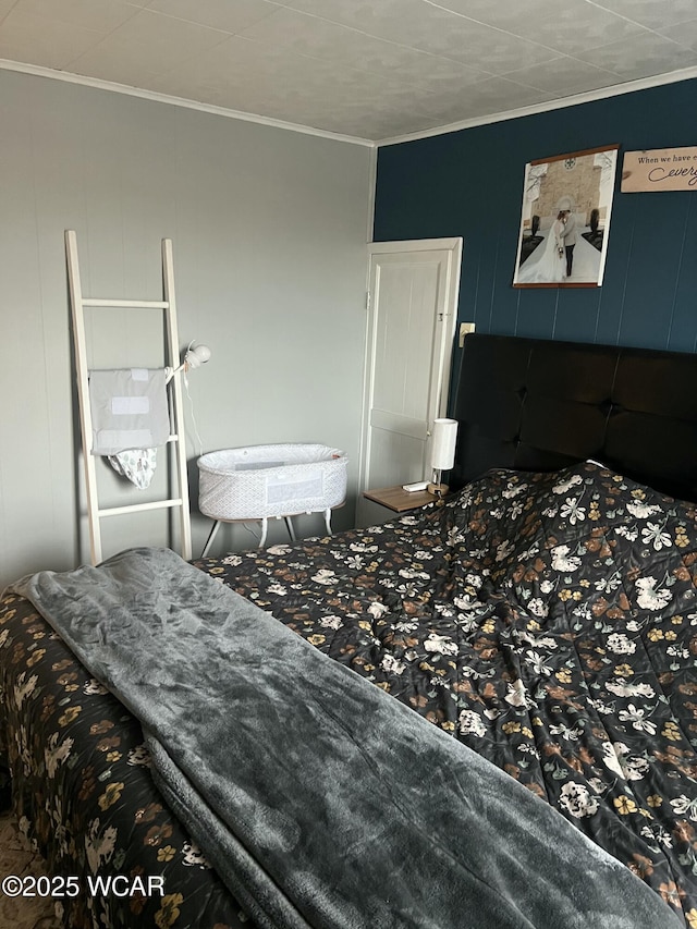 bedroom with crown molding