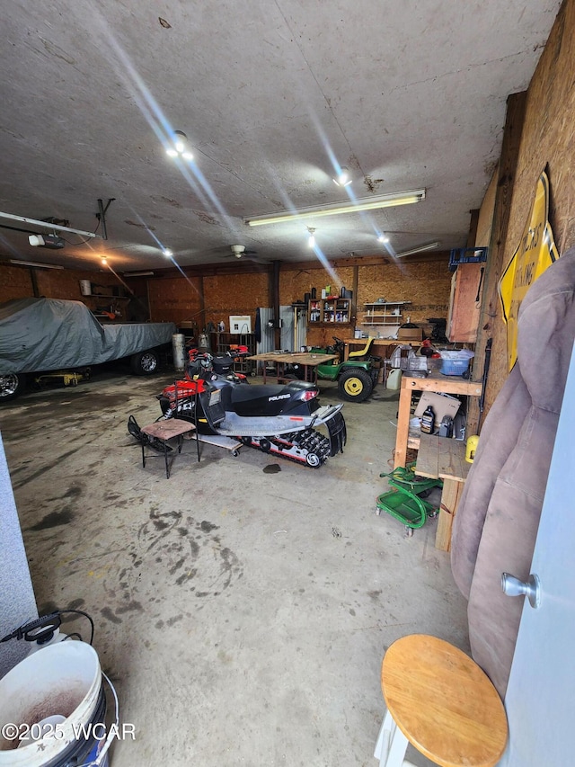garage with a workshop area