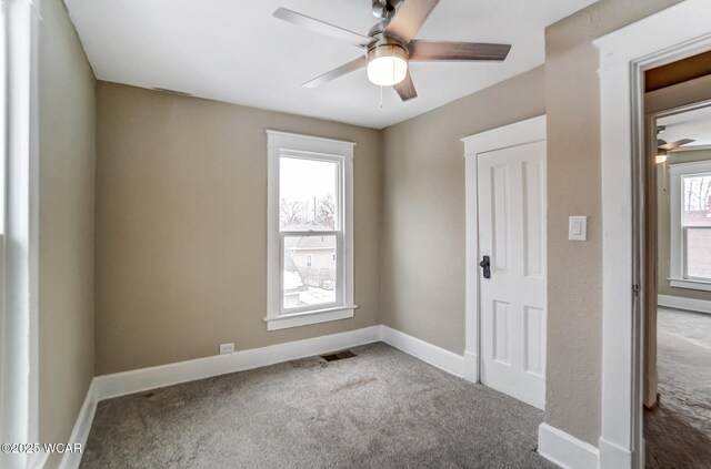 520 Orena Ave, Lima, OH 45804 - unfurnished room featuring ceiling fan, a healthy amount of sunlight, and carpet