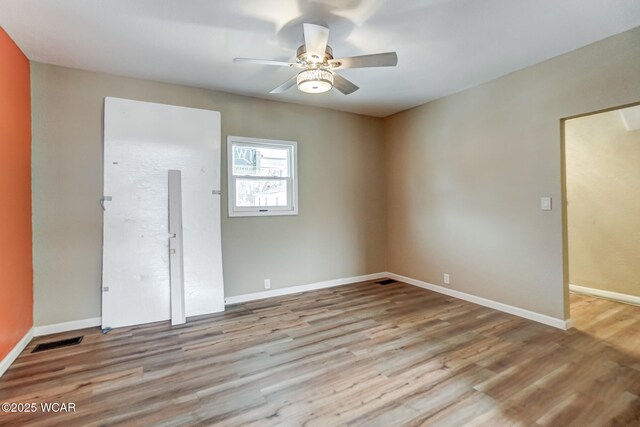 520 Orena Ave, Lima, OH 45804 - empty room featuring ceiling fan and light wood-type flooring