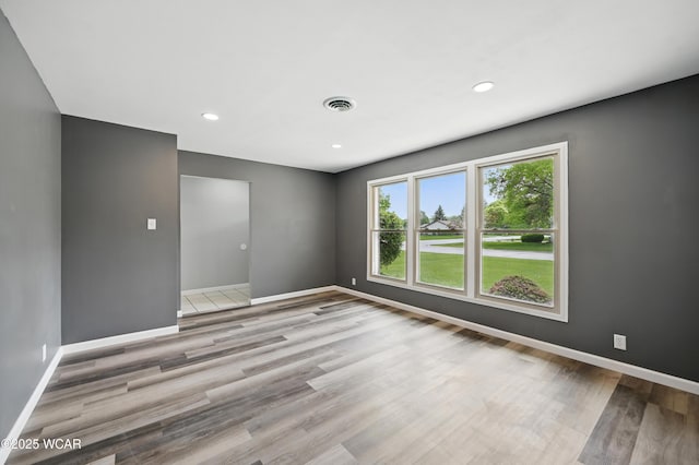 4836 Willow St, Lima, OH 45807 - empty room featuring baseboards, wood finished floors, and recessed lighting