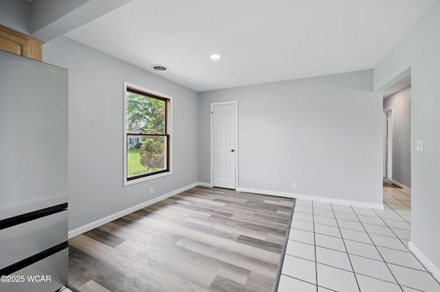 4836 Willow St, Lima, OH 45807 - spare room featuring baseboards, recessed lighting, and light wood finished floors