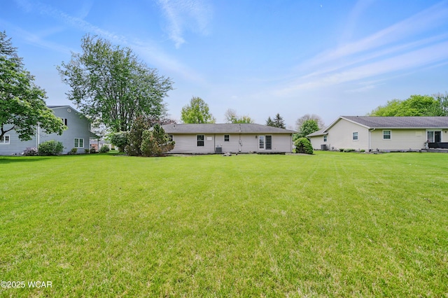 4836 Willow St, Lima, OH 45807 - rear view of house with a lawn