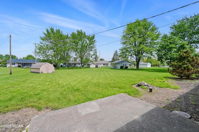 4836 Willow St, Lima, OH 45807 - view of green lawn with a shed and an outdoor structure