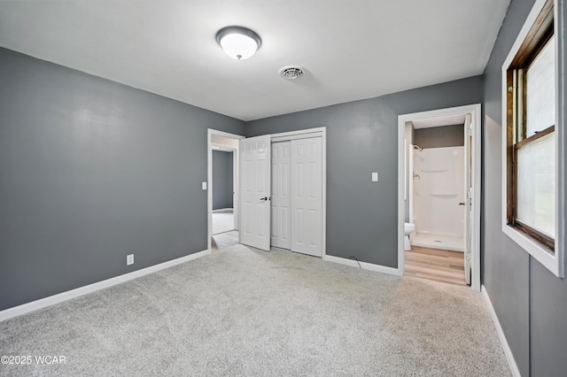 4836 Willow St, Lima, OH 45807 - unfurnished bedroom with carpet flooring, baseboards, a closet, and ensuite bath