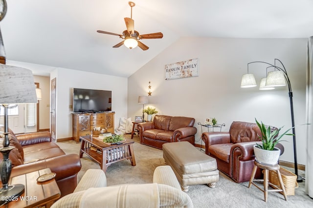 living room featuring ceiling fan, lofted ceiling, and light carpet