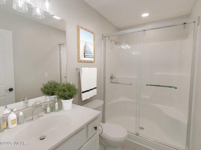 3232 Schooler Rd, Lima, OH 45806 - bathroom featuring a stall shower, vanity, and recessed lighting