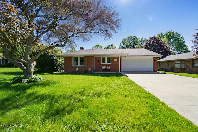 2715 Goldenrod Ln, Findlay, OH 45840 - single story home with a garage, driveway, a chimney, a front yard, and brick siding