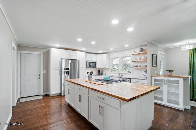 2715 Goldenrod Ln, Findlay, OH 45840 - kitchen with wood counters, appliances with stainless steel finishes, white cabinets, recessed lighting, and dark wood-type flooring