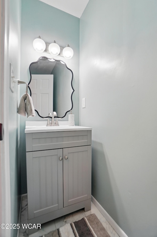 2715 Goldenrod Ln, Findlay, OH 45840 - bathroom with vanity, baseboards, and marble finish flooring