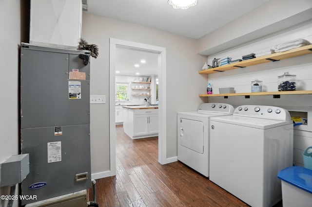 2715 Goldenrod Ln, Findlay, OH 45840 - laundry area with dark wood-type flooring and washer and clothes dryer