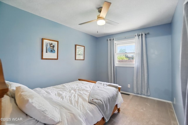2715 Goldenrod Ln, Findlay, OH 45840 - carpeted bedroom with baseboards and a ceiling fan