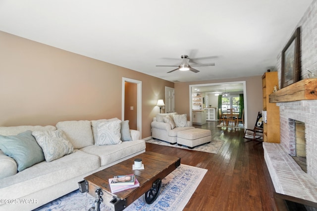 2715 Goldenrod Ln, Findlay, OH 45840 - living room with ceiling fan, dark wood-style floors, and a fireplace